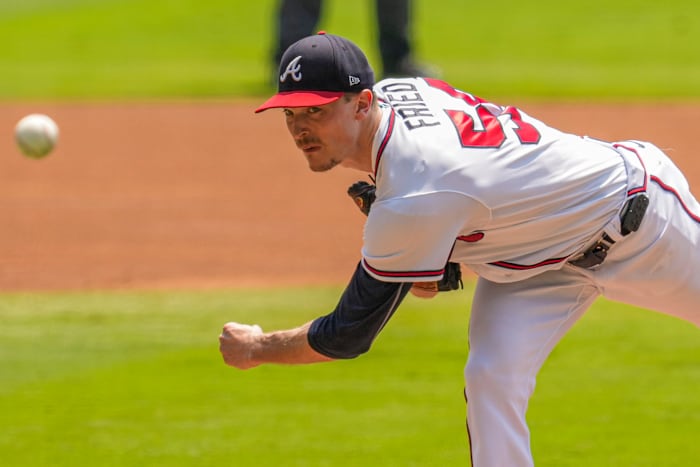 Aug 20, 2023; Cumberland, Georgia, USA; Atlanta Braves starting pitcher Max Fried (54) pitches against the San Francisco Giants during the first inning at Truist Park.